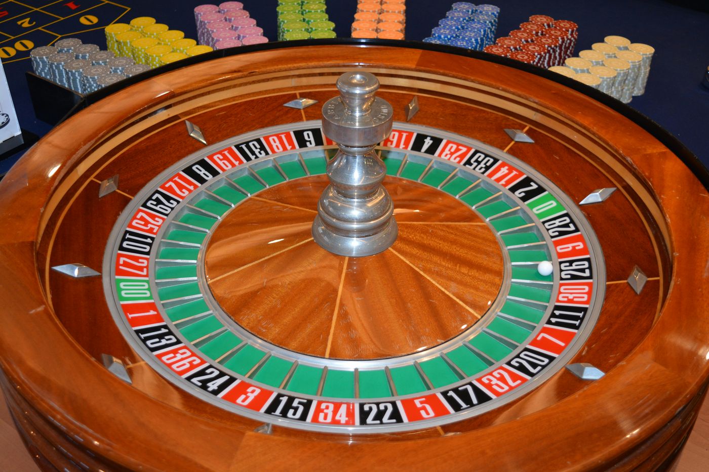 Casino roulette wheel with the ball landed on black 26